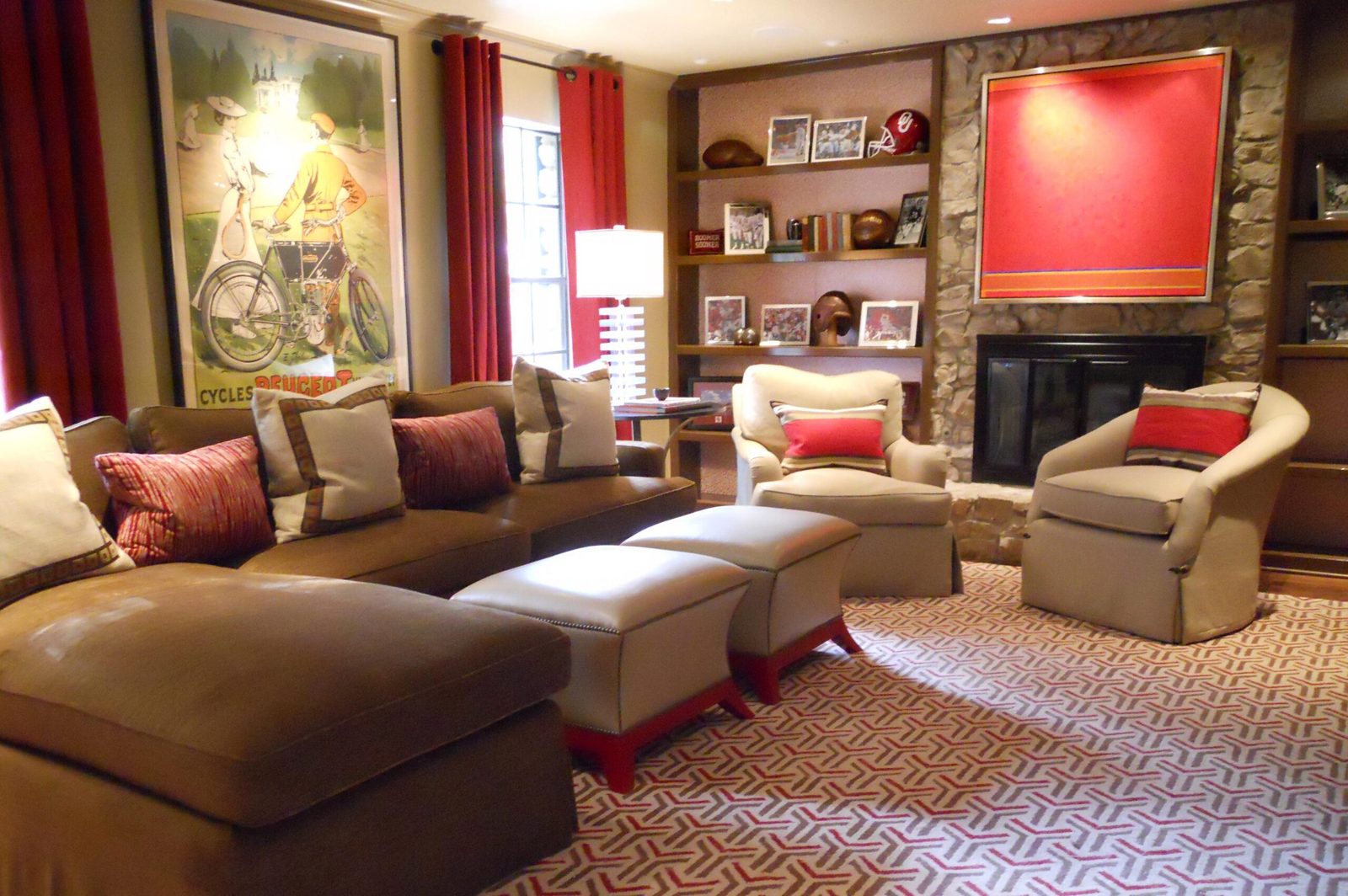 Salon-style installation of framed works in a Houston collector’s den, art services by SBAS