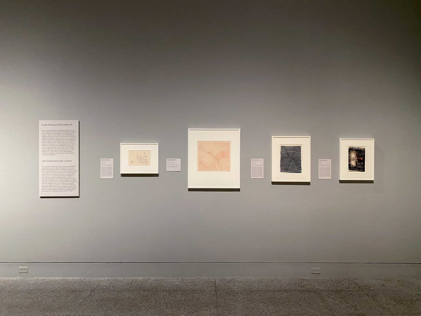 Exhibition installation of matted works on paper, framing by SBAS Houston