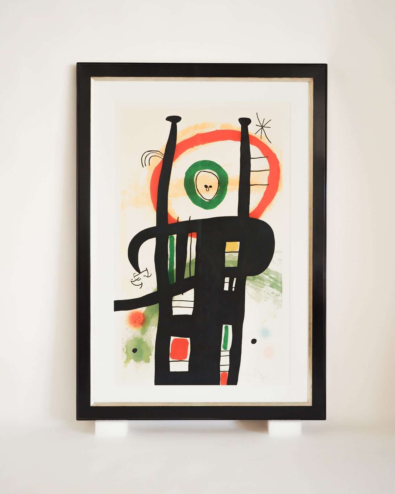 Miró lithograph in an antique black frame with gilded detail, SBAS Houston