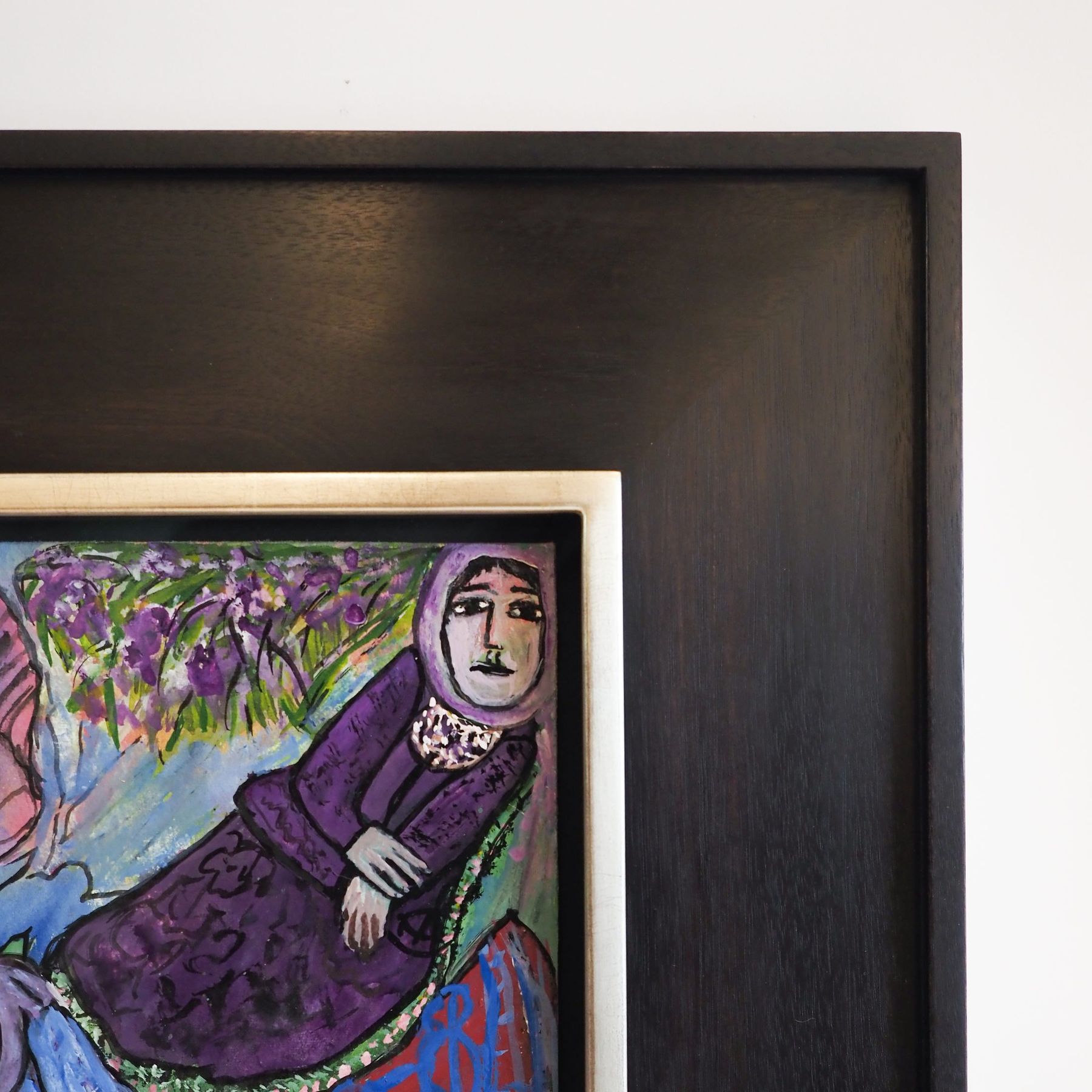 Detail of an ebonized frame with water-gilded lip, SBAS Houston