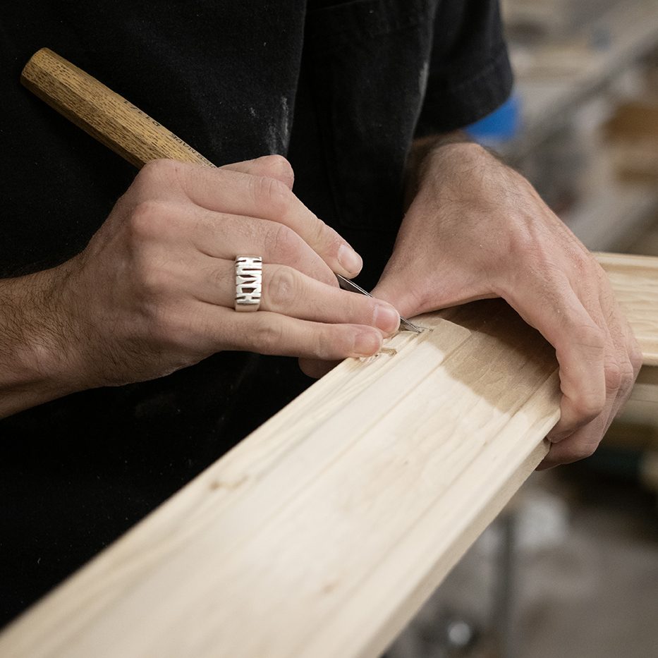 Carving and detail work on a basswood frame before gilding, SBAS Houston