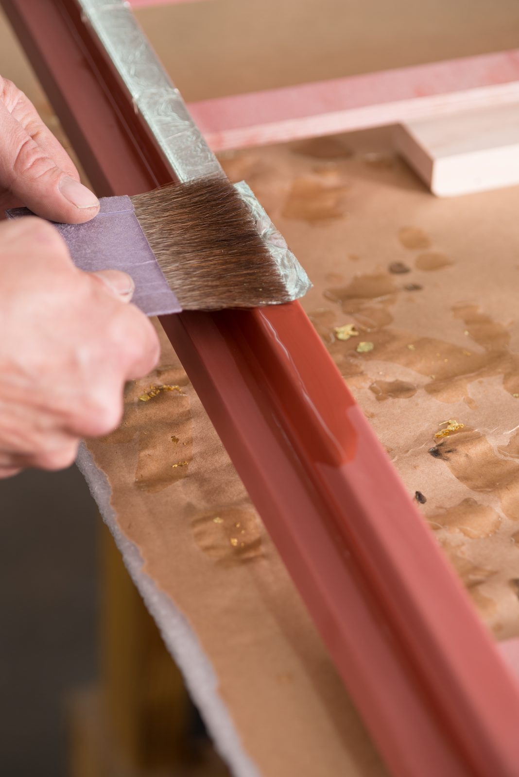 Laying gold leaf onto a water-gilded frame, SBAS Houston