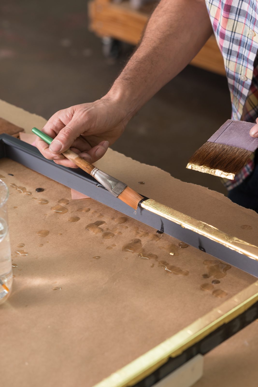 Wetting the clay bole before laying gold leaf, SBAS Houston
