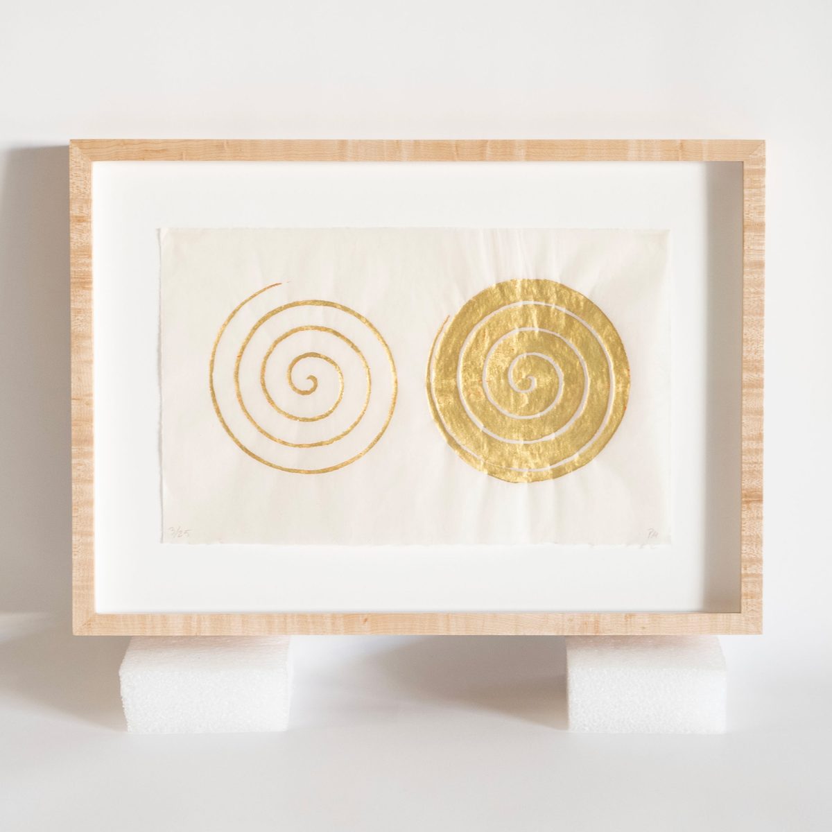 Paul Mogensen gold leaf spiral print in a bird's eye maple frame, SBAS Houston