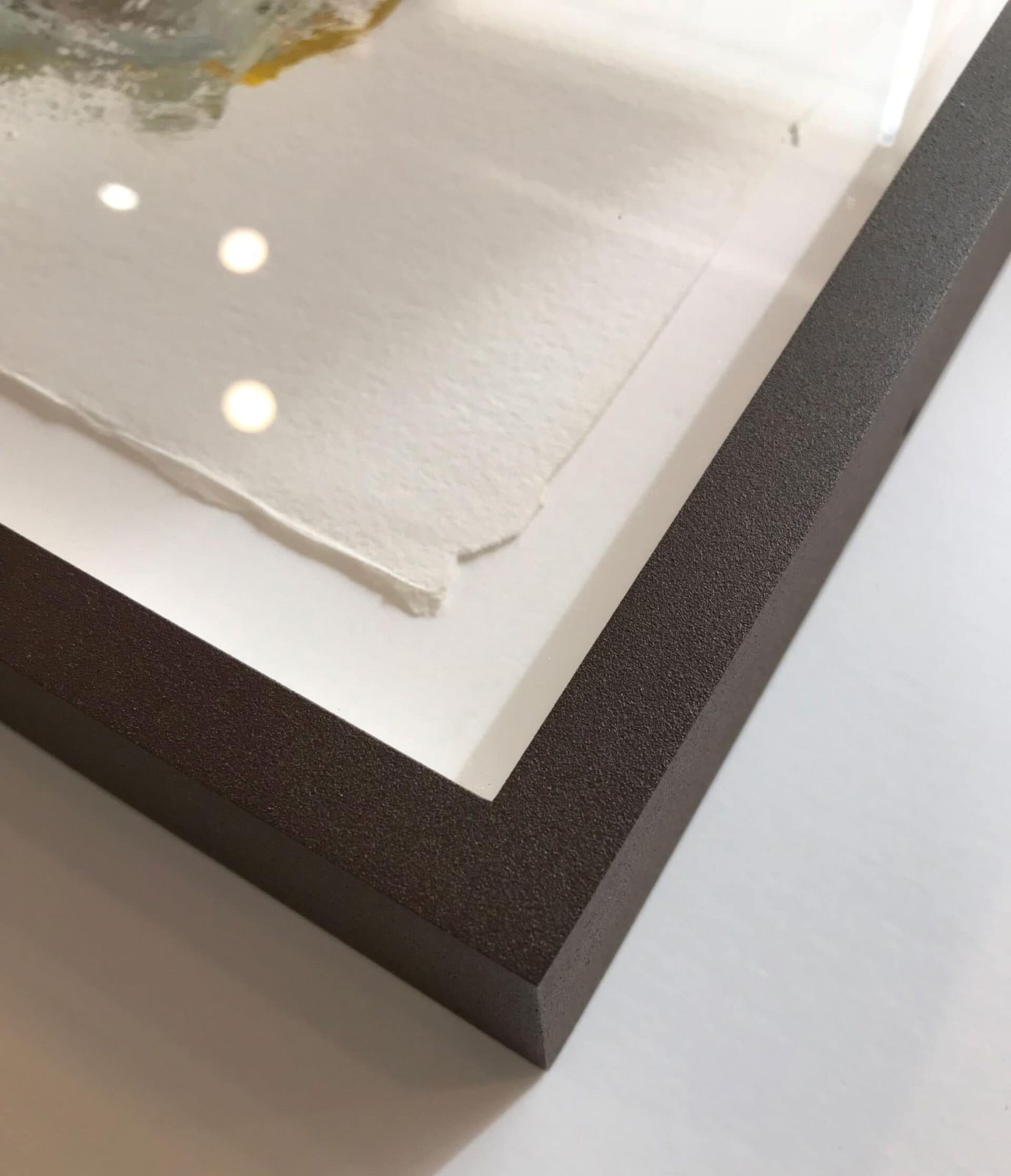 Linen-wrapped float frame with deckled-edge paper, corner detail, SBAS Houston