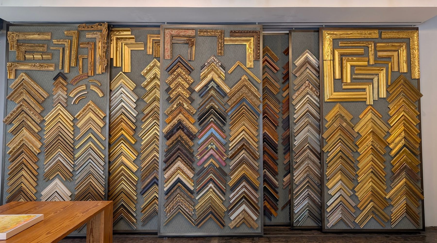 Corner-sample wall in the Sarah Balinskas Art Services showroom in Houston