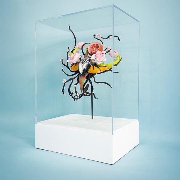 Sculpture on a color-matched armature sealed under an acrylic bonnet, SBAS Houston