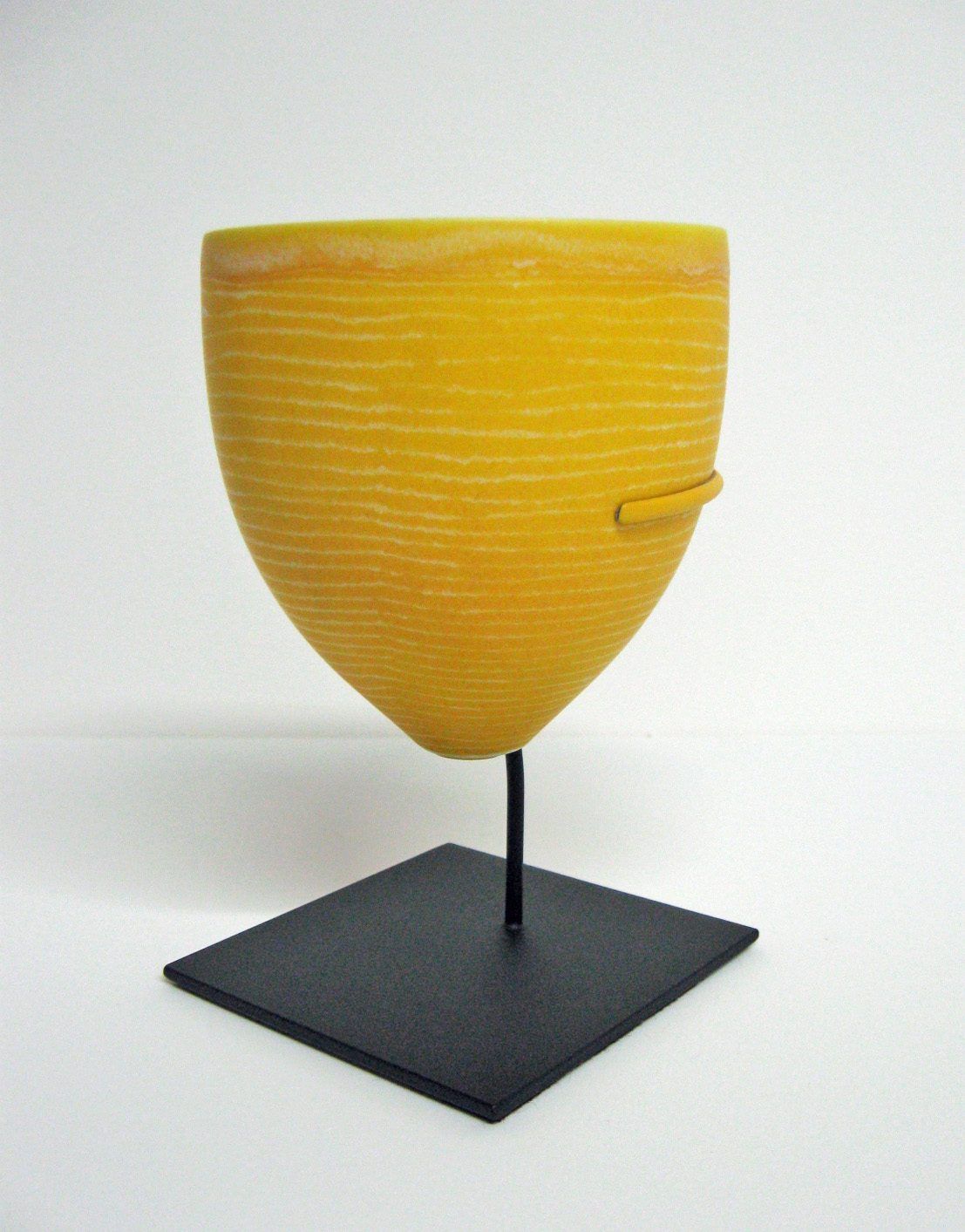 Glass vessel on a custom steel pedestal mount, SBAS Houston