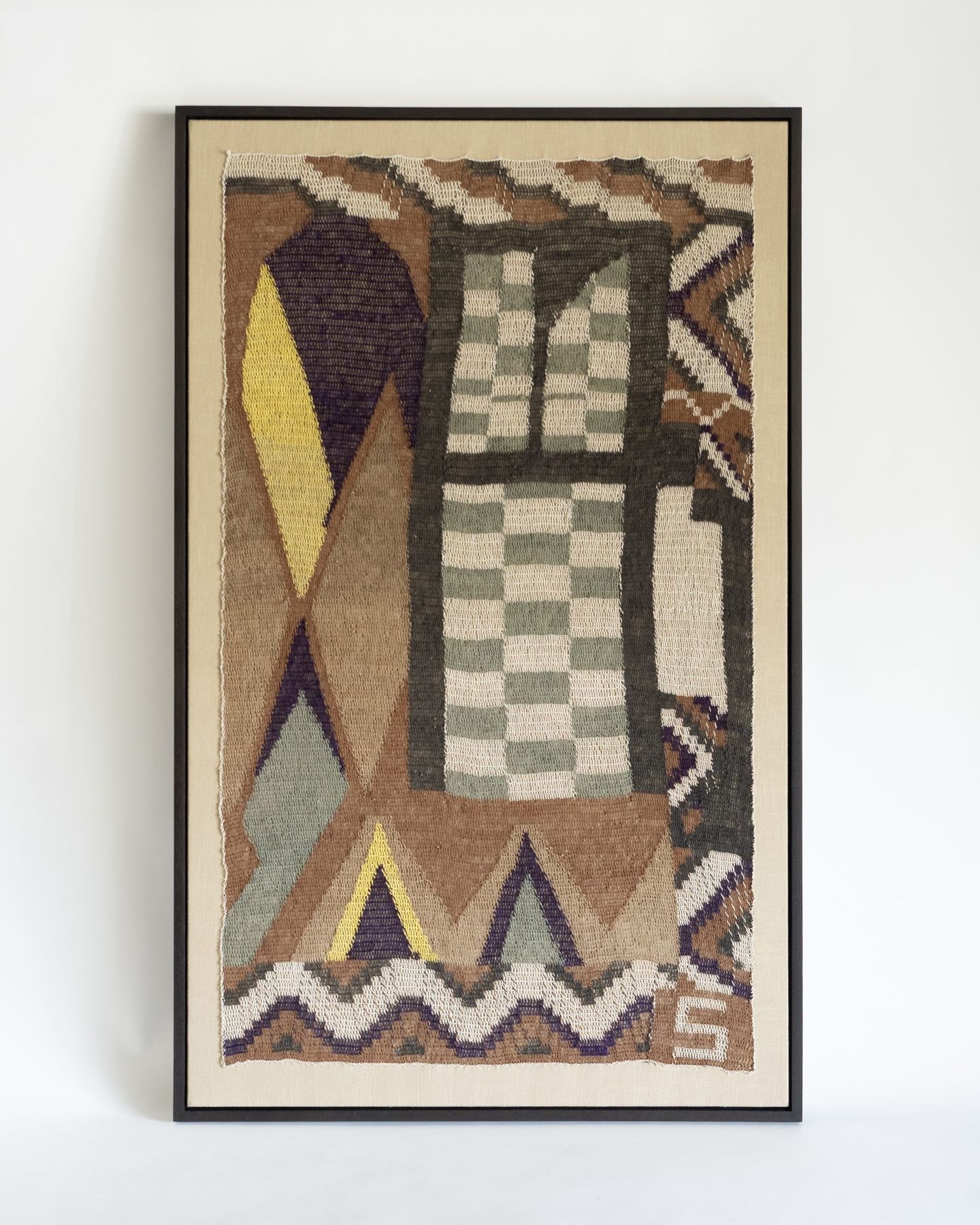 Handwoven tapestry stitched to a padded archival mount inside a deep float frame, SBAS Houston