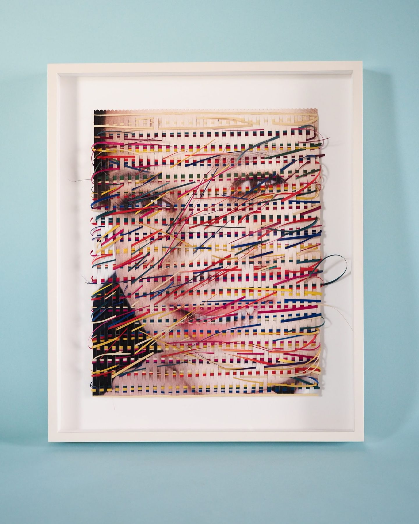 Mixed-media textile work in a white aluminum frame, SBAS Houston
